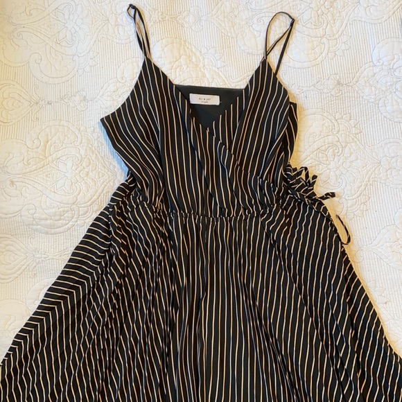 Ali and Jay Black and Tan stripped dress size large dress with pleated skirt - Picture 3 of 11